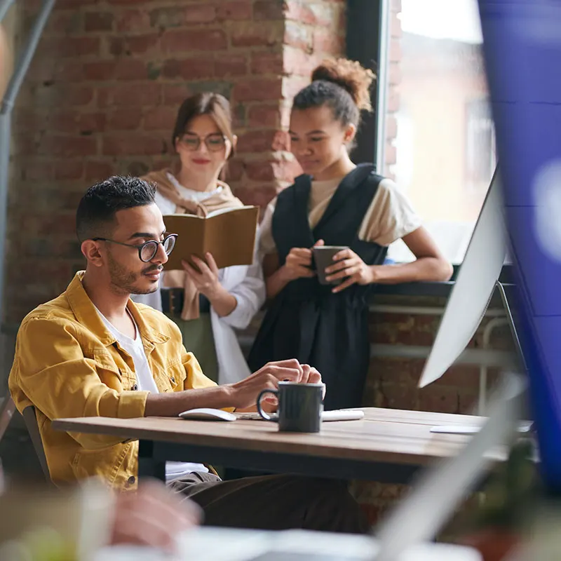 Students collaborating around a table